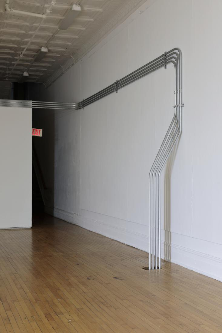 Western Standards K80X4, 2019. Dimension variable. Electrical conduit connected to building's power supply, 4 LED lamps, existing architecture