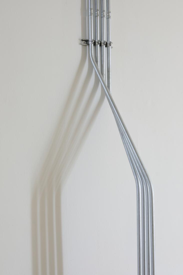 Western Standards K80X4, 2019. Dimension variable. Electrical conduit connected to building's power supply, 4 LED lamps, existing architecture