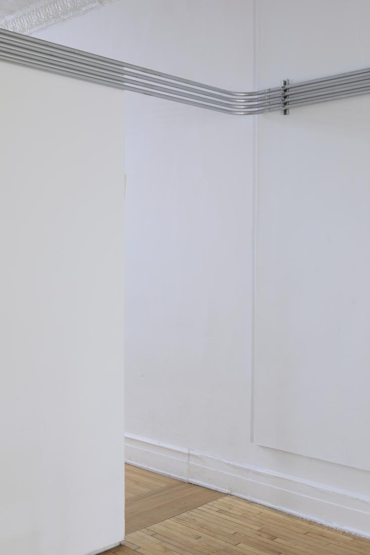 Western Standards K80X4, 2019. Dimension variable. Electrical conduit connected to building's power supply, 4 LED lamps, existing architecture